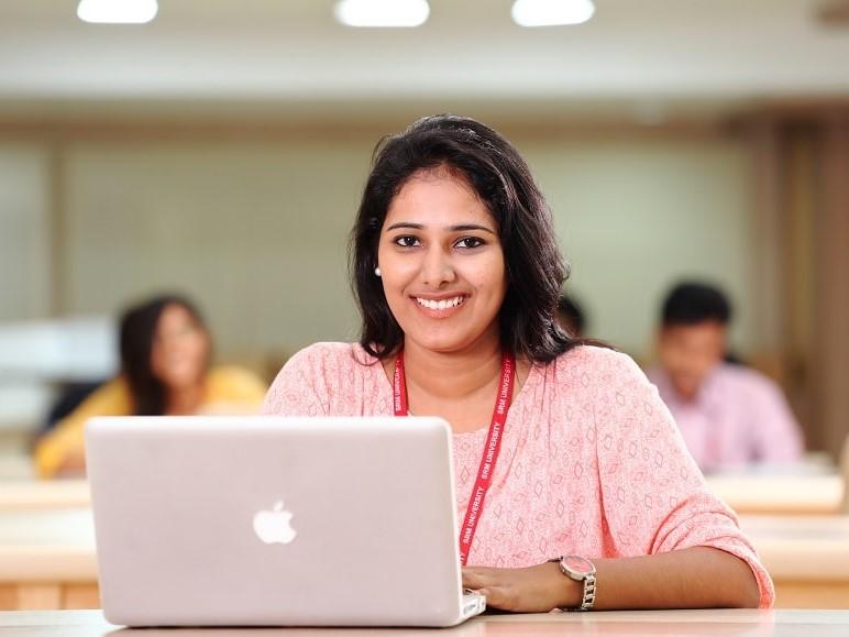 girl with a MacBook